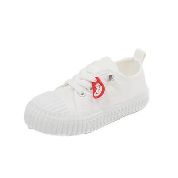 Kindergarten boy's white shoes