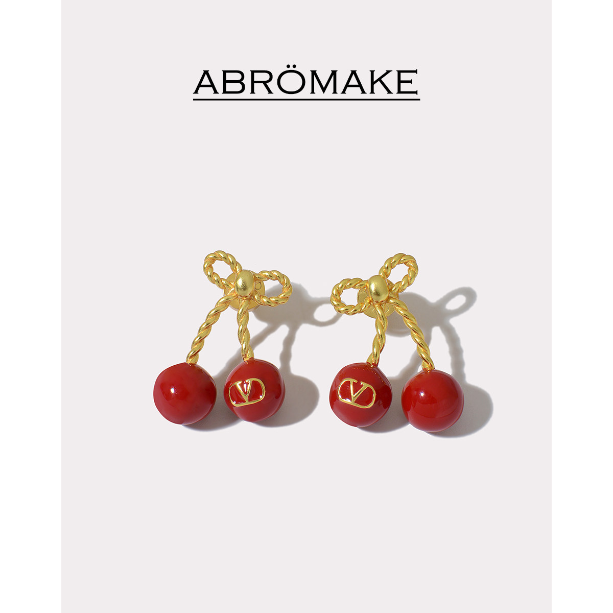 【ABROMAKE】French-style bow earrings, unique and sophisticated red cherry earrings for women.