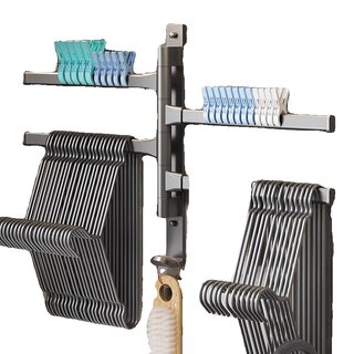 Hole-free folding wall-mounted clothes hanger storage rack rotating
