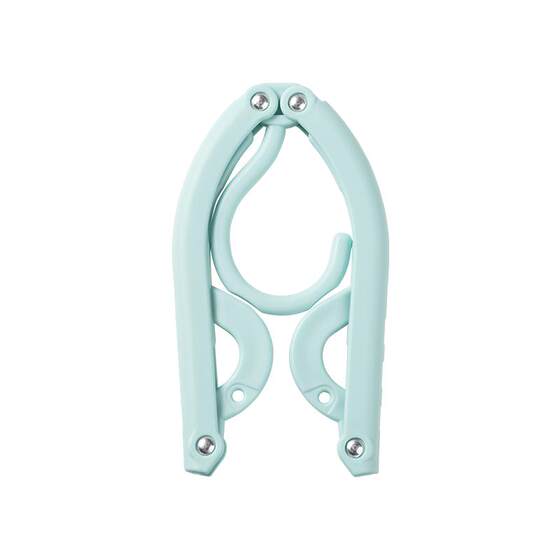 Travel folding clothes hanger with clip
