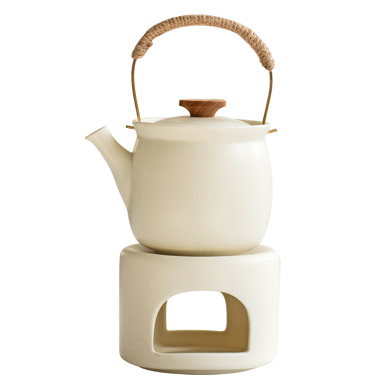 Thirty-year-old small porcelain teapot with raised beams
