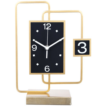 Simple and luxurious style clock placed on the living room desktop