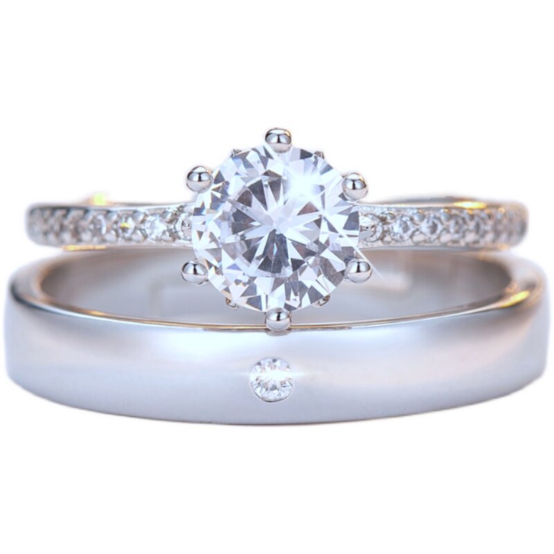 Simulated wedding rings and live props couple