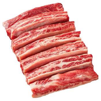 Fresh raw cut grain fed beef ribs snow rich