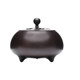 The copper incense burner weighs 1.25 kg and comes with a chicken wing wood base.