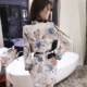 Đêm thị trường phụ nữ 2018 mùa thu mới tính khí in ấn V-Cổ thấp cắt eo giảm béo strapless hip dài tay đầm