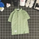 Mùa hè Nhật Bản thêu retro màu rắn ngắn tay áo polo nam và nữ vài chiếc áo sơ mi Polo xu hướng phiên bản Hàn Quốc của áo thun