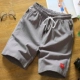 Quần short nam mùa hè quần âu nam năm quần nam bảy quần lỏng quần đi biển quần thể thao quần thủy triều
