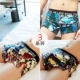 Quần lót nam in hình lỏng quần đùi sexy cạp thấp cotton tinh khiết cá tính tất cả cotton mũi tên xu hướng hiển thị quần đùi - Giống cái