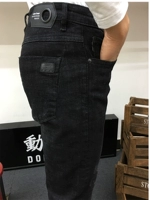 Lông cừu chà quần jean mùa đông dày phần tinh khiết đen mỏng nhung ấm chân Slim quần denim nam sức mạnh gia súc quần bò nam