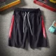 Quần short nam mùa hè Quần đi biển phiên bản Hàn Quốc của Slim mùa hè lỏng lẻo màu đen sang trọng quần tất nam