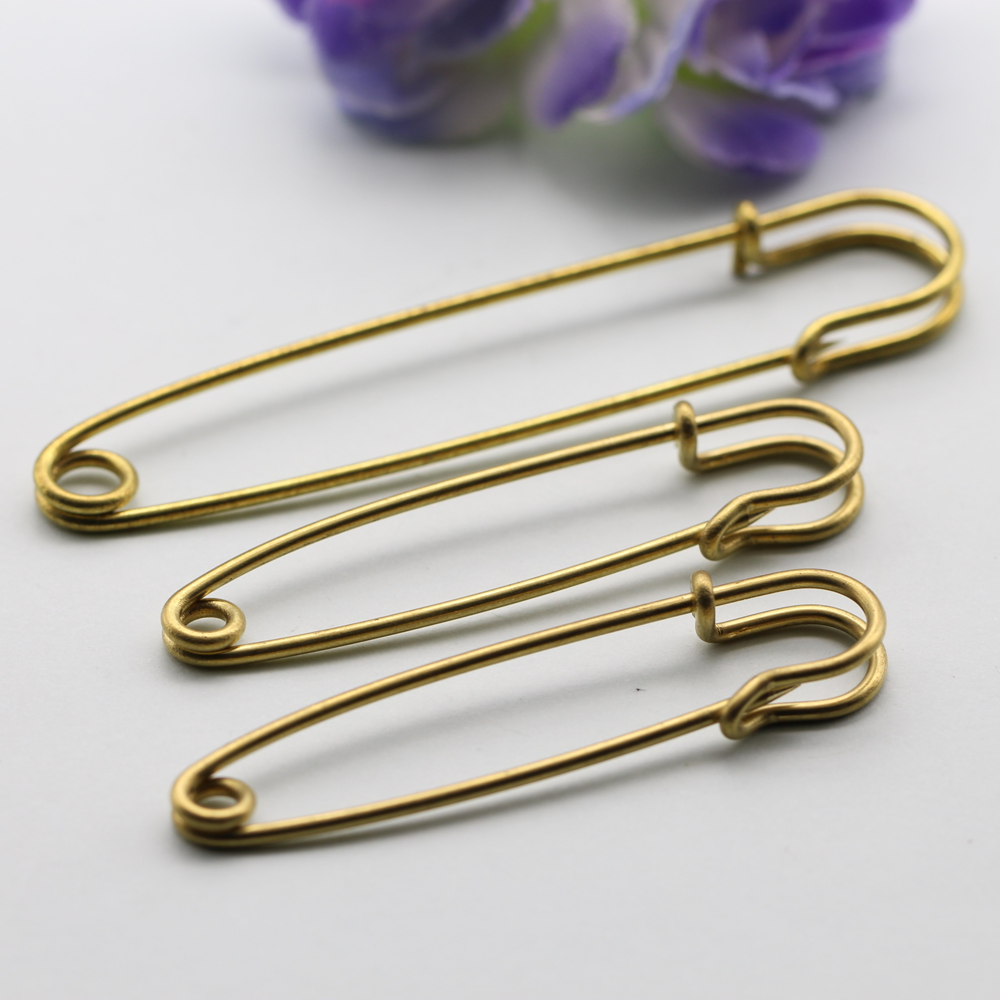 铜别针怎么翻译_铜别针英文用法_铜别针英语例句_淘宝翻译网