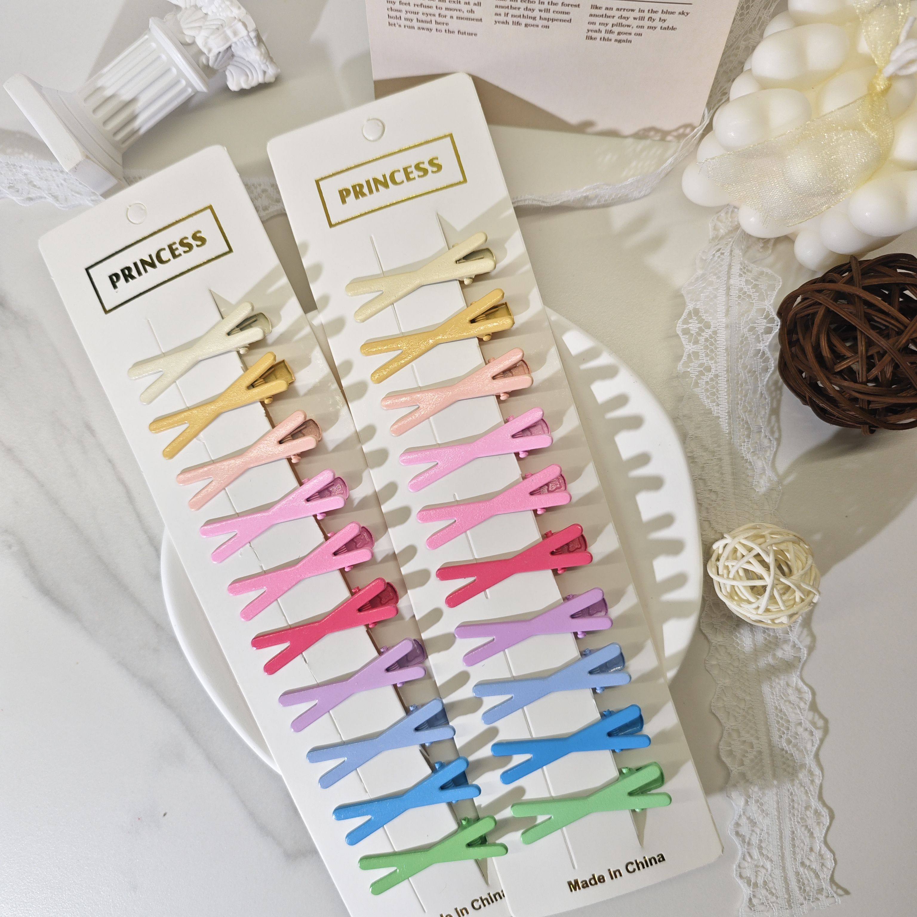 十字发夹怎么翻译_十字发夹英文用法_十字发夹英语例句_淘宝翻译网