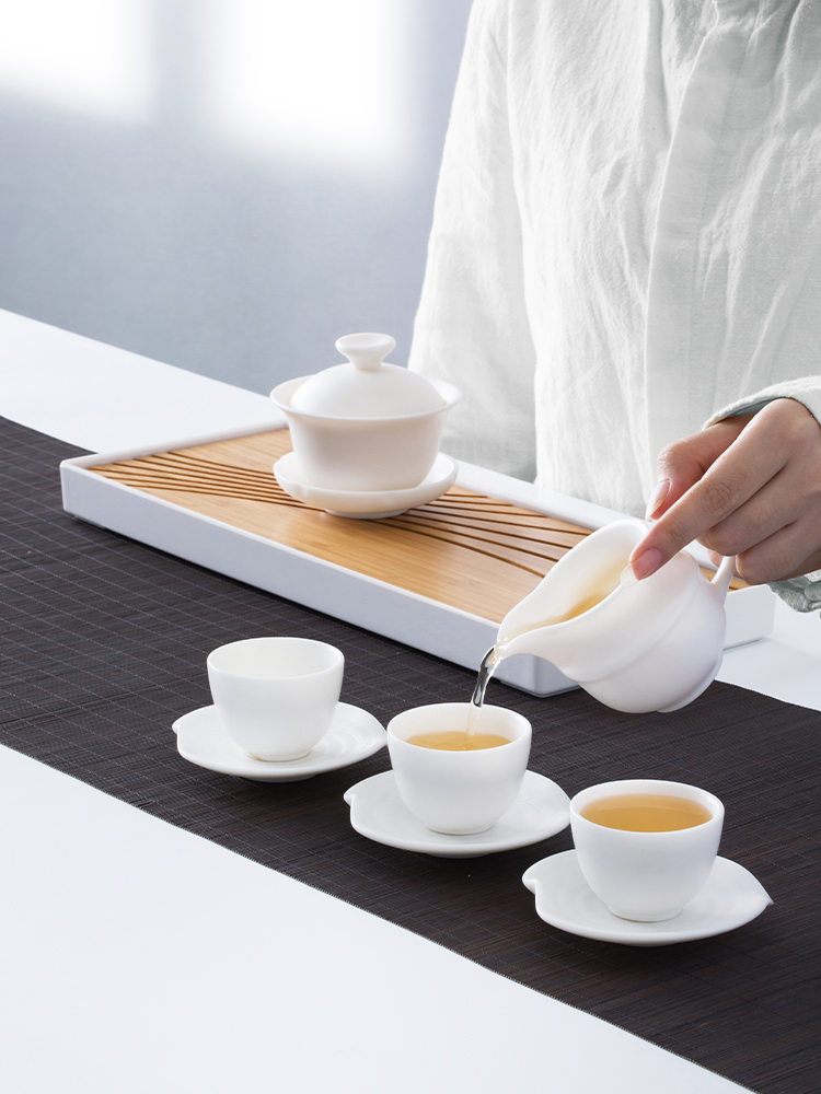 And creation of a complete set of tea set ceramic kung fu tea set of dehua white porcelain craft tureen sample tea cup