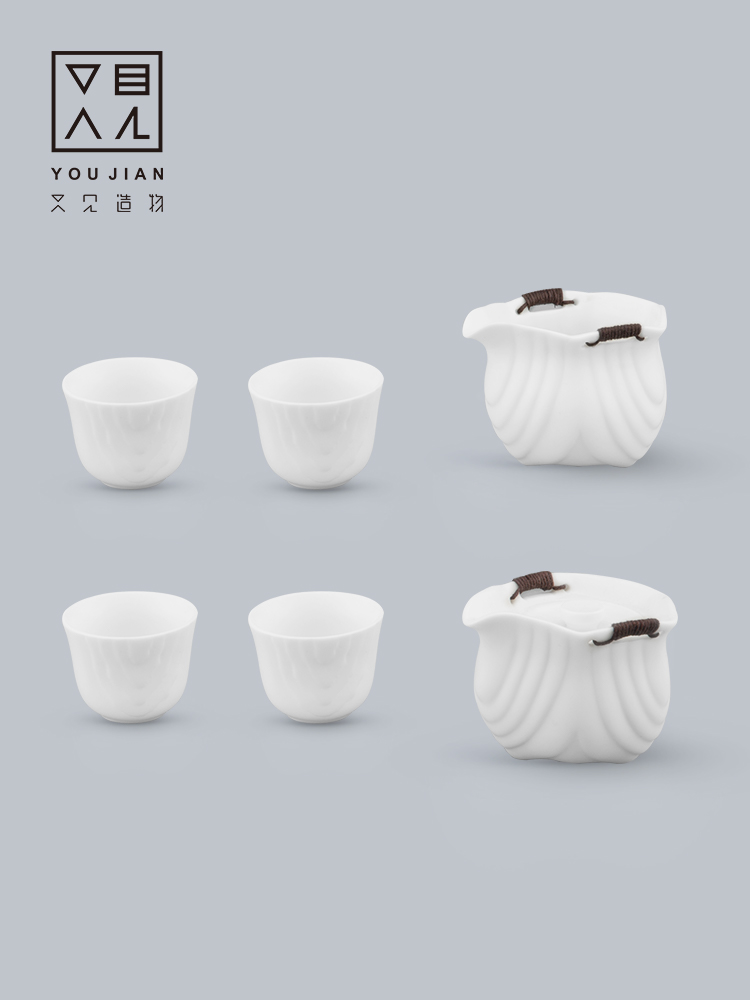 Dehua white porcelain kung fu tea set suit household contracted set of ceramic tea cups tea hand grasp pot of Chinese style