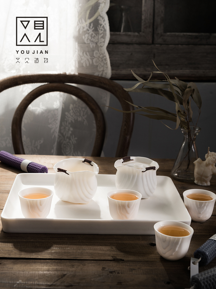Dehua white porcelain kung fu tea set suit household contracted set of ceramic tea cups tea hand grasp pot of Chinese style