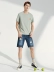 A21 hè mới denim quần short nam xu hướng thun thấp eo nam quần jeans thời trang quần nam - Quần jean