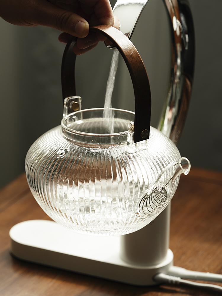 Cloud (vertical stripes high - temperature thickening glass teapot household heating electric TaoLu cooking pot fire boil tea