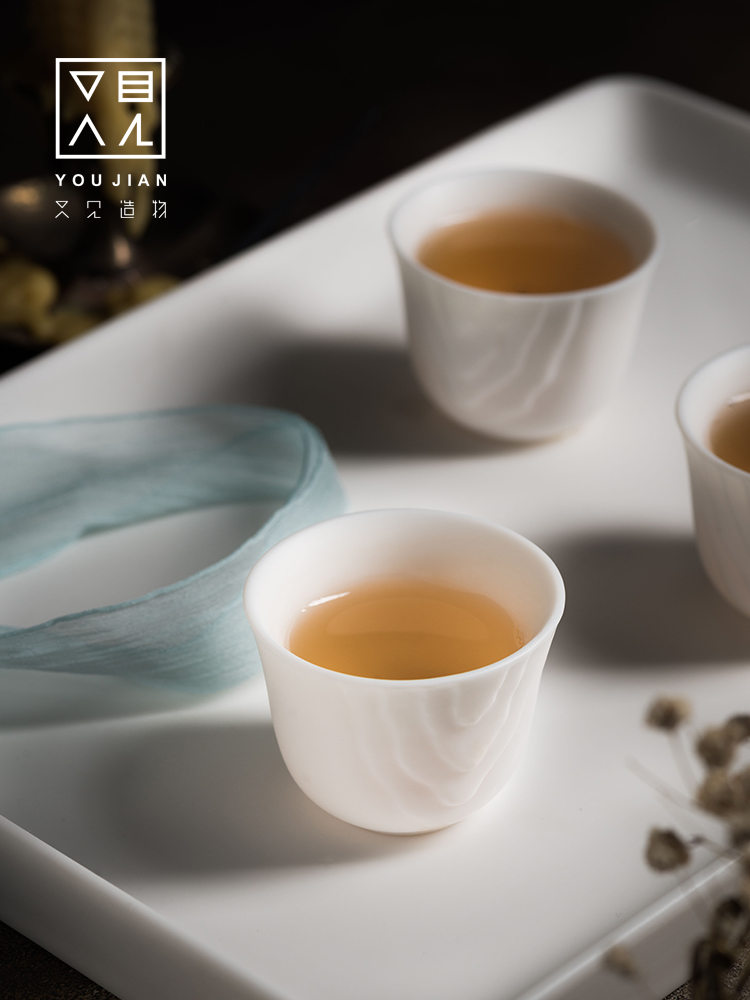 Dehua white porcelain kung fu tea set suit household contracted set of ceramic tea cups tea hand grasp pot of Chinese style