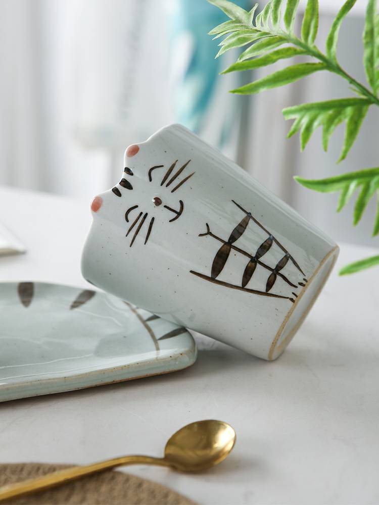 Creative Japanese ceramic keller of coffee cup with content disc coarse pottery hand - drawn cartoon cup a birthday present