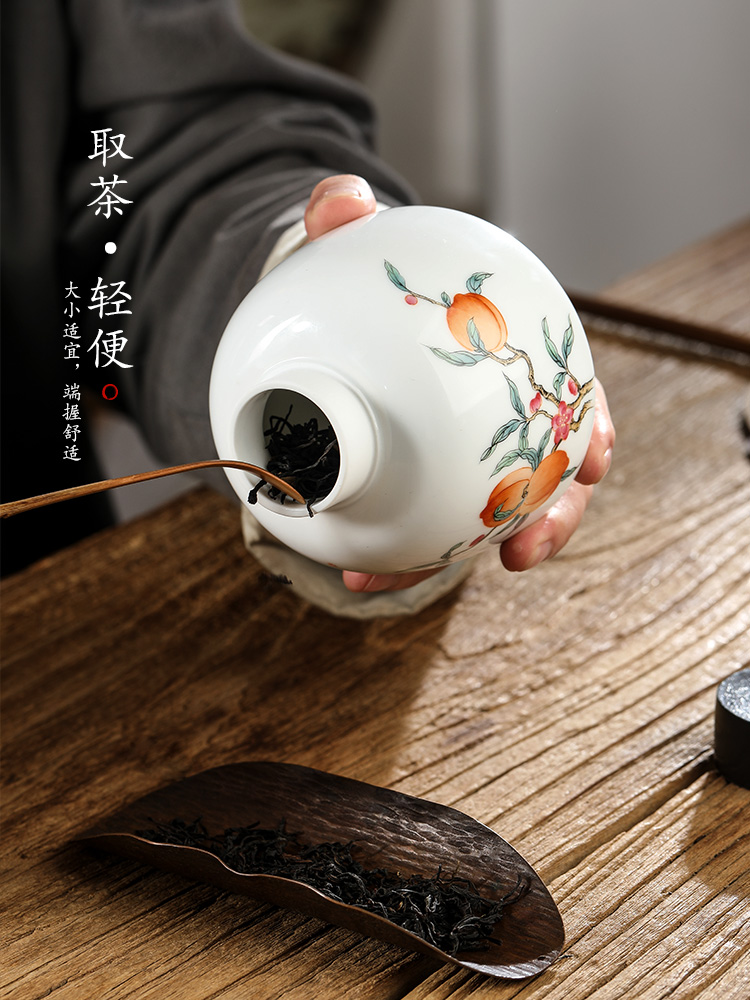 Jingdezhen pure manual white porcelain tea pot hand - made peach ceramic seal pot home tea tea storage tanks