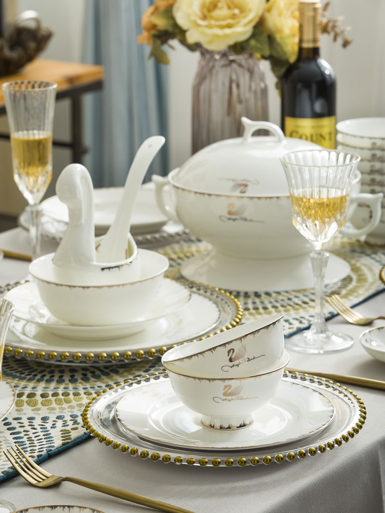 The dishes suit household porcelain tableware dishes chopsticks contracted Europe type 56 skull jingdezhen ceramic combination yellow up phnom penh