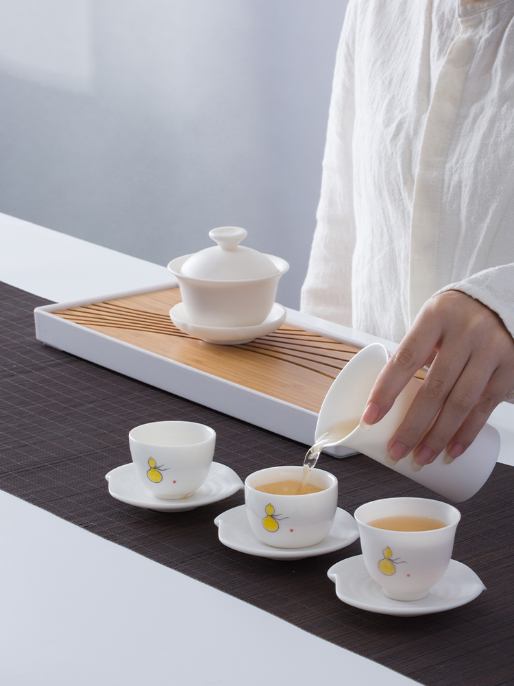 And creation of kung fu tea set the set of dehua white porcelain hand - made ceramic tureen cups the whole household