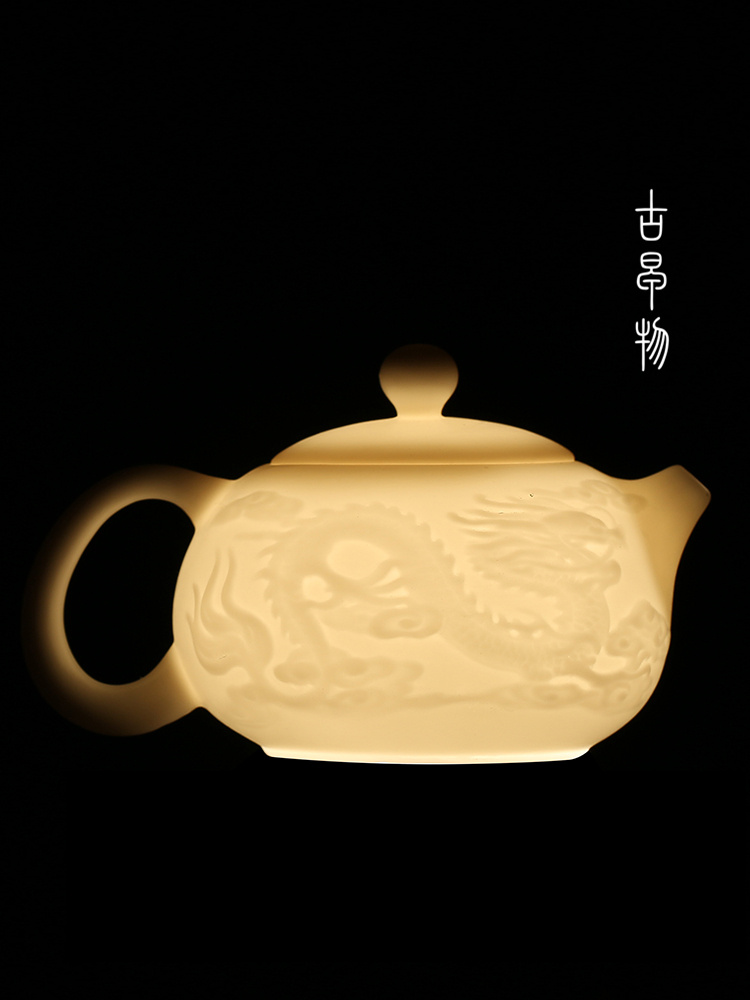 Dehua suet jade biscuit firing manual white porcelain kung fu tea set suit household ceramic teapot of a complete set of tea cups