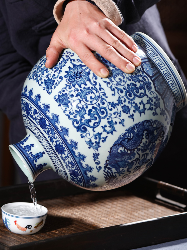 Jingdezhen ceramic terms bottle is blue and white porcelain jars hip 10 jins to hand - made of pomegranate it empty wine bottles of liquor