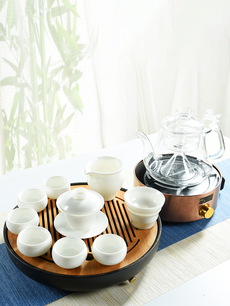 The cabinet dehua white porcelain kung fu tea set home office contracted dry tea plate glass ceramic electric TaoLu suits for