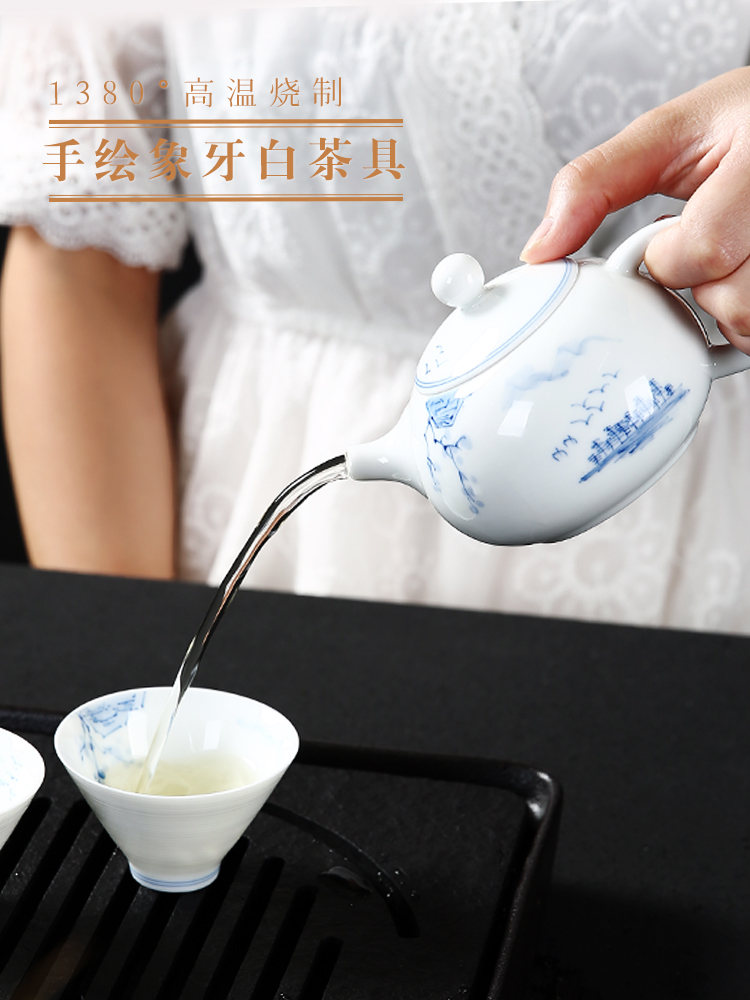 Dehua hand - made kung fu tea sets tea cup simple household ceramic white porcelain lid bowl of a complete set of tea sets