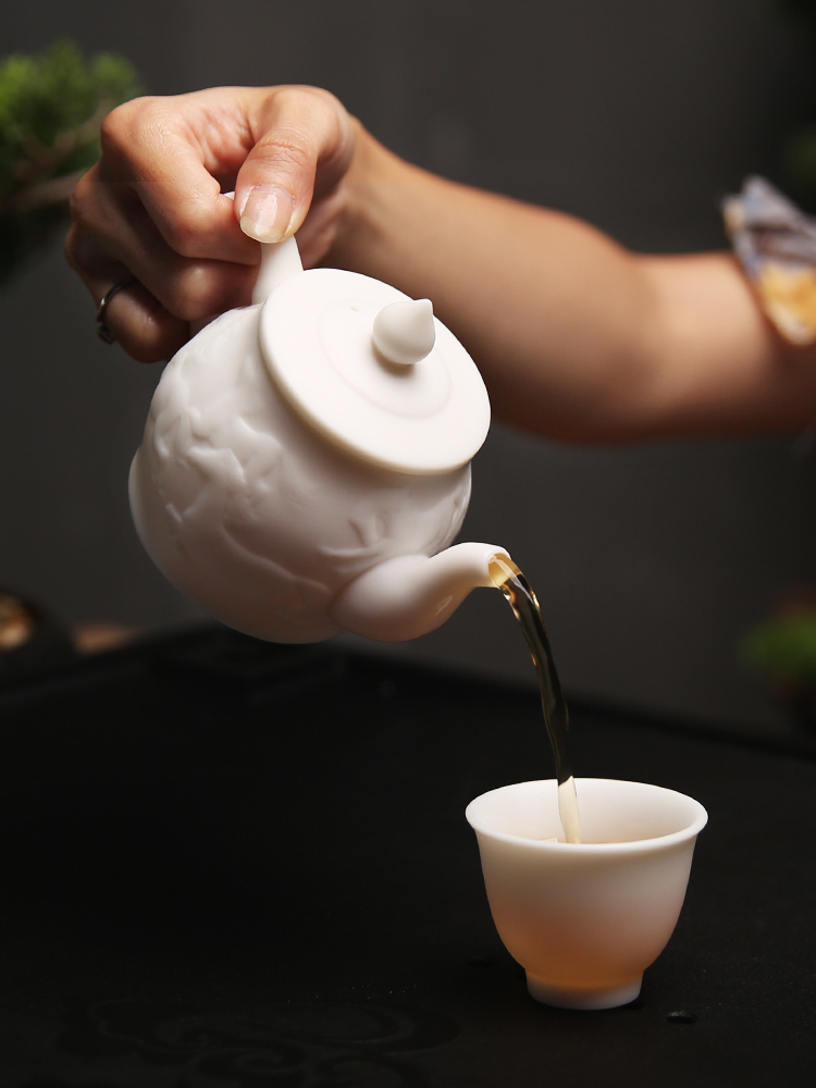 Quality ceramic teapot dehua porcelain remit suet jade white porcelain single pot of forceful glaze household wrap girder pot of tea