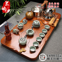 High-grade Kung Fu tea set Pear solid wood tea tray Automatic whole set of fast furnace four-in-one household simple