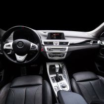 Suitable for 16-21 BMW X1 interior modified high-end air outlet decoration stickers new X2 water Cup frame lifter