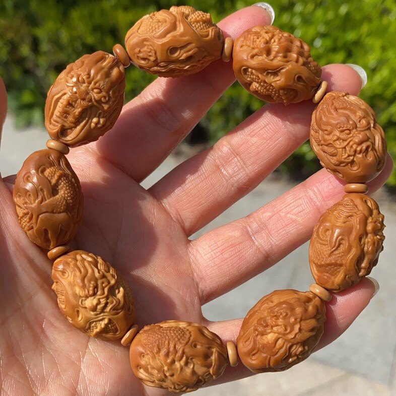Olive core carving bracelets Jiulong Xianrui bracelets for men Nangong carved olive nucleus bracelets Nine Dragons opera beads bracelets for women