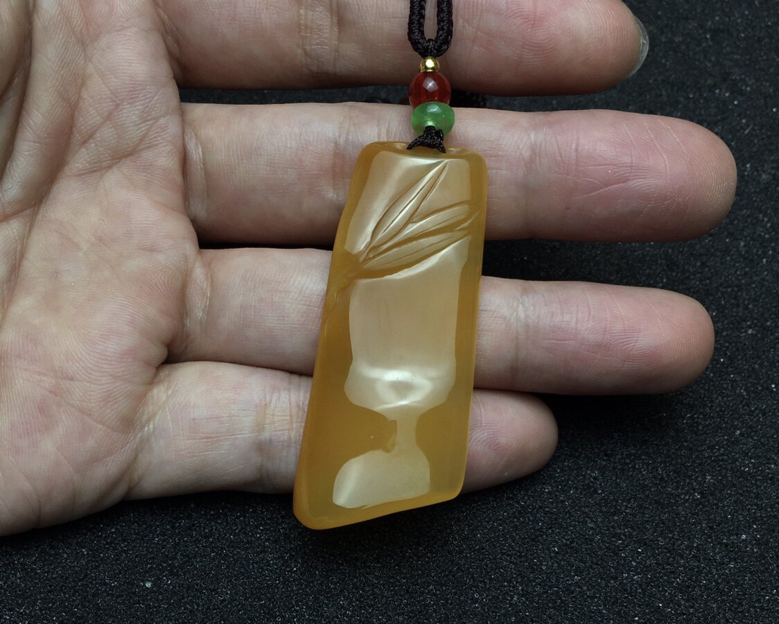 Bamboo newspaper Ping An pendant Yunnan Huanglongyu seed stock Ice germline chicken oil yellow listing male and female with bamboo card necklace natural jade