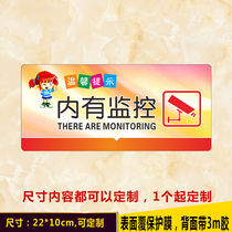 There is a monitoring automatic alarm in the video surveillance reminder board. Acrylic waterproof transparent sign warning Post