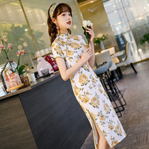 College entrance examination cheongsam 2021 new summer young girl retro yellow flower modified dress flag victory