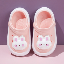 Girl bag hole shoes outer wearing cute children beach sandy drag in big boy cute rabbit two slippers