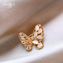 Cat eye butterfly brooch small pin hollow delicate and luxurious and luxurious Western suit chest flower anti-walking light clothes accessories accessories