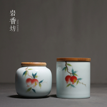 Yan Xiangfang hand-painted pomegranate shadow celadon small tea pot ceramic bamboo cover sealed portable storage tea can