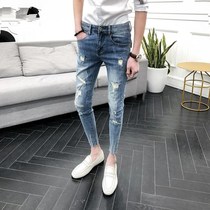 Hong Kong fashion brand summer new ripped jeans mens Korean version of the trend slim small feet pants mens wild nine-point pants