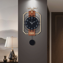 Chinese clock wall clock living room creative luxury deer head new atmosphere Chinese style free punch modern pendant clock