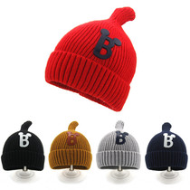 Childrens hats autumn and winter boys tide pullover knitwear hat baby warm ear protection cap flip leather logo wool cap