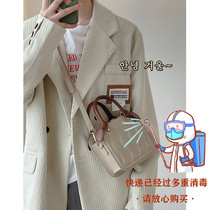 France Cone Koery Genuine Leather Diagonal Satchel Bag 2022 New tide Fashion Hit with Handheld Biscuit single shoulder bag