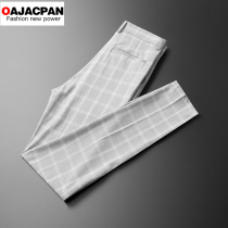 Light luxury spring and autumn mens casual pants Korean tide business Plaid British sports trousers thin small feet slim trousers men