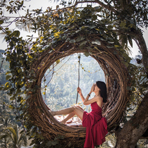 Outdoor round creative bed Birds Nest rattan hammock scenic spot Net red card Bali wedding photography shooting props