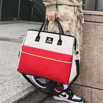 Large capacity lightweight portable travel bag Korean version of the travel bag shoulder bag Short trip men and women boarding bags
