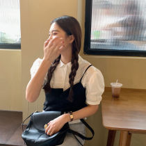 Set female spring and summer new Korean version of design sense small foreign temperament short shirt top camisole two-piece set