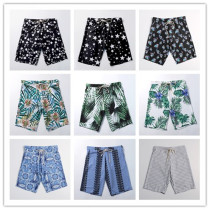 Mens beach pants Summer loose big code speed dry pants Korean version casual seaside Flowers lovers Tide Cards Big Pants
